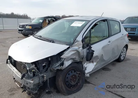 2012 Toyota Yaris Le z USA, uszkodzony, nr VIN JTDKTUD37CD537716